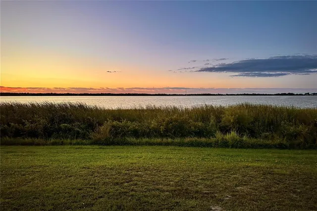 a view of mountain with lake view