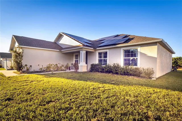 a view of a house with swimming pool