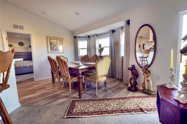 a view of a livingroom with furniture