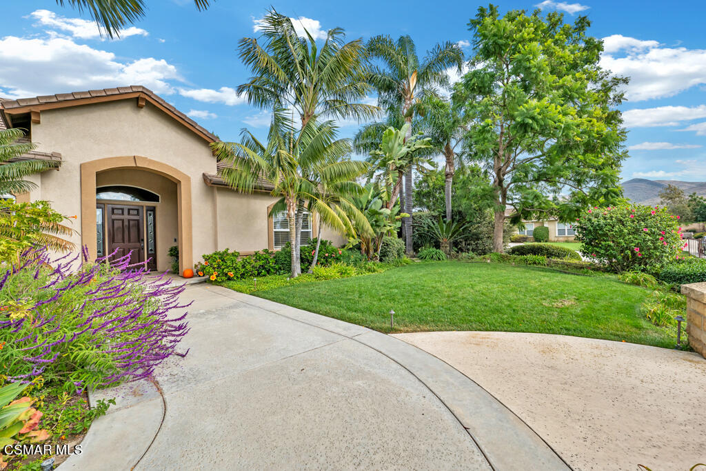 1776 Corte Jubilo Camarillo, CA 93012 - Photo 14 of 74 a front view of a house with a yard