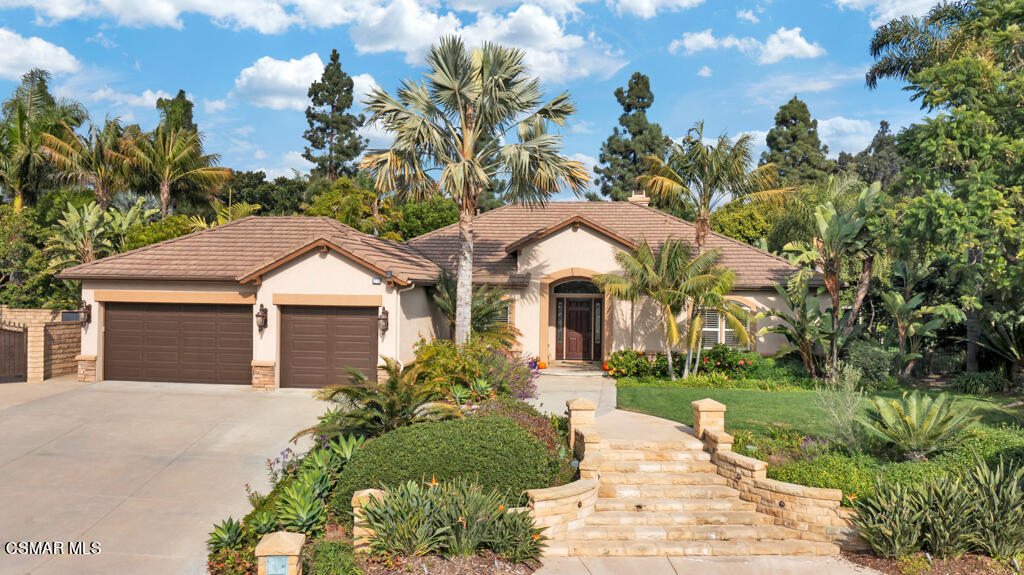 1776 Corte Jubilo Camarillo, CA 93012 - Photo 2 of 74 a front view of a house with a garden