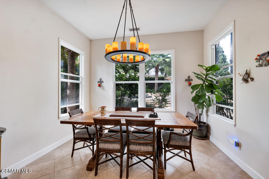 1776 Corte Jubilo Camarillo, CA 93012 - Photo 27 of 74 a view of a dining room with furniture window and chandelier