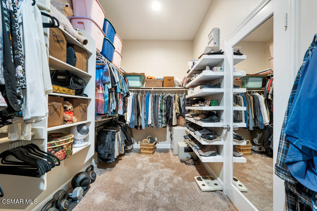 1776 Corte Jubilo Camarillo, CA 93012 - Photo 37 of 74 a view of walk in closet with clothes and shoes