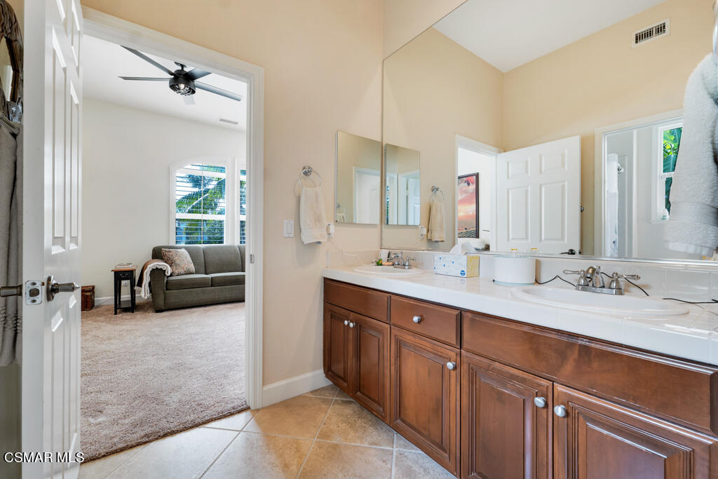 1776 Corte Jubilo Camarillo, CA 93012 - Photo 39 of 74 a en suite bathroom with double vanity and a mirror