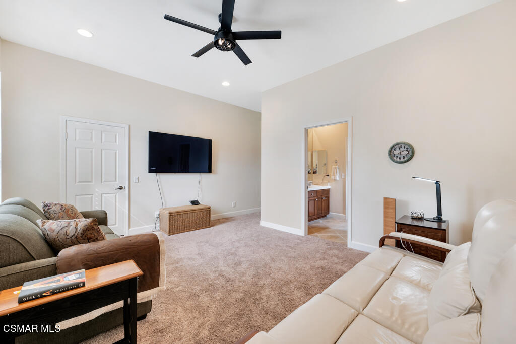 1776 Corte Jubilo Camarillo, CA 93012 - Photo 41 of 74 a living room with furniture and a flat screen tv