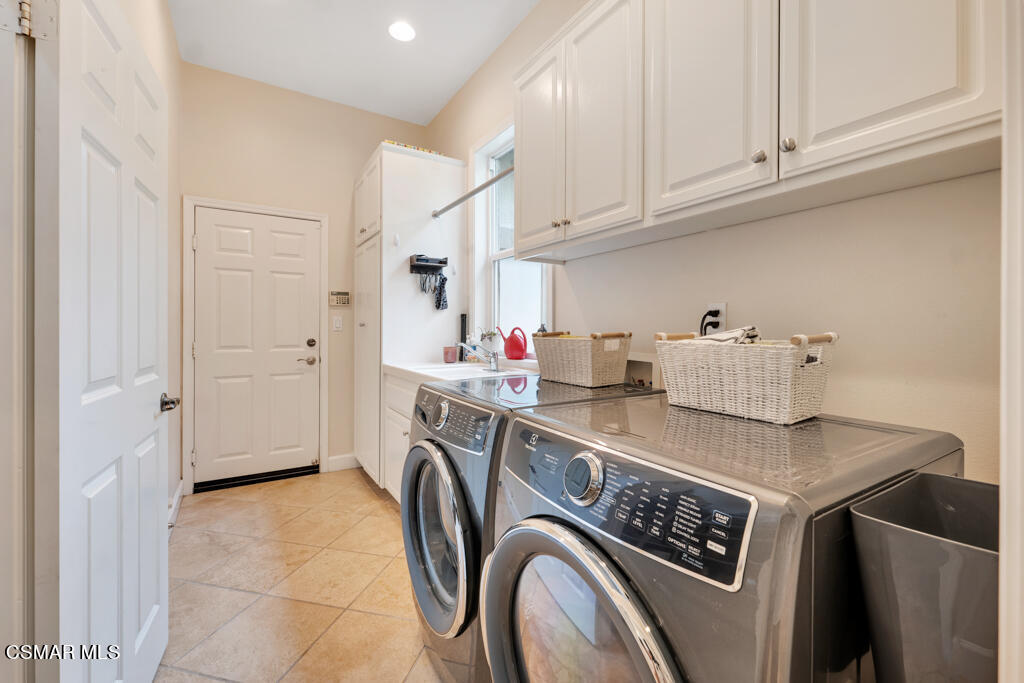 1776 Corte Jubilo Camarillo, CA 93012 - Photo 44 of 74 a utility room with sink dryer and washer