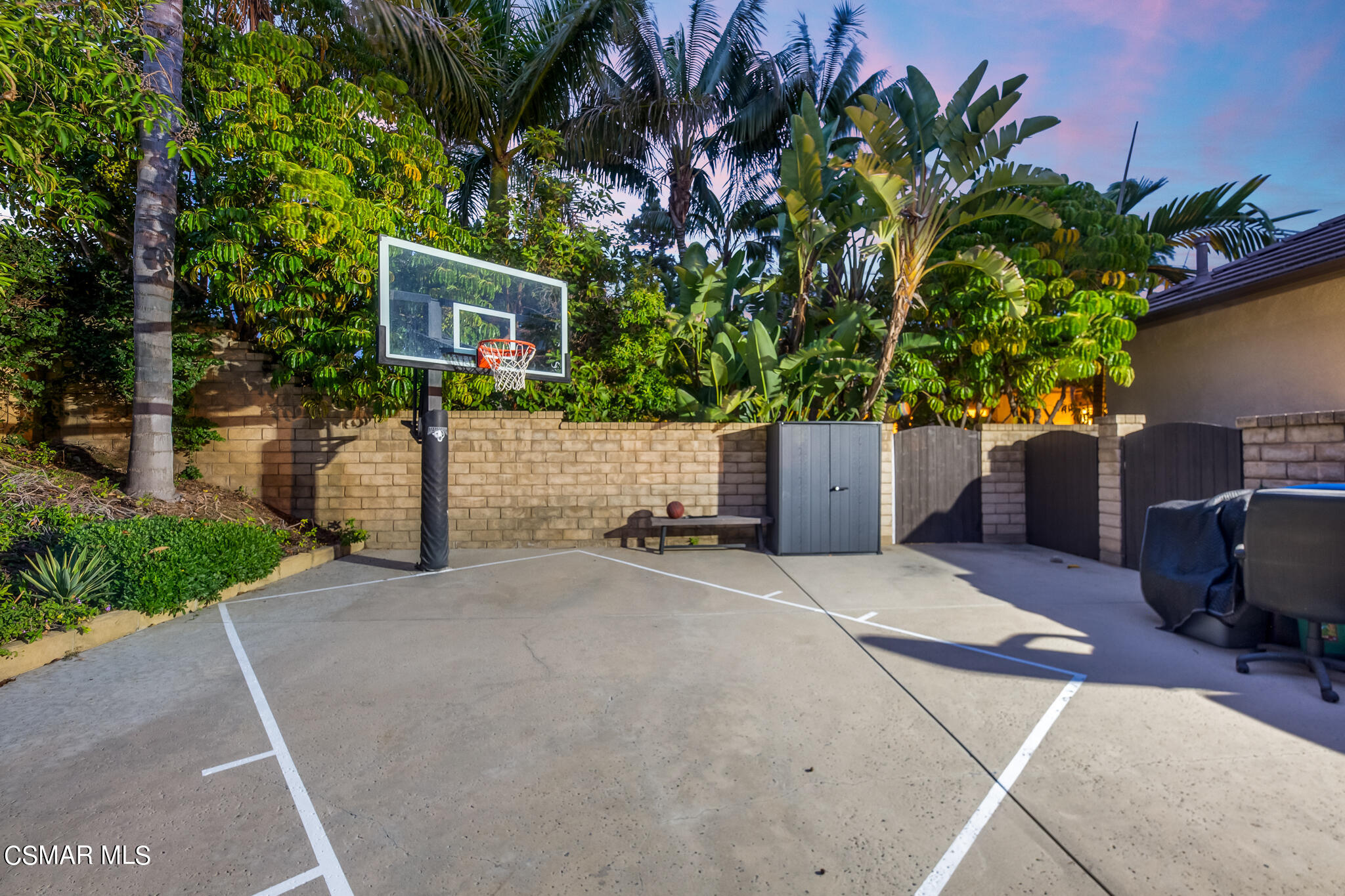 1776 Corte Jubilo Camarillo, CA 93012 - Photo 60 of 74 a front view of a house with a yard and a garage