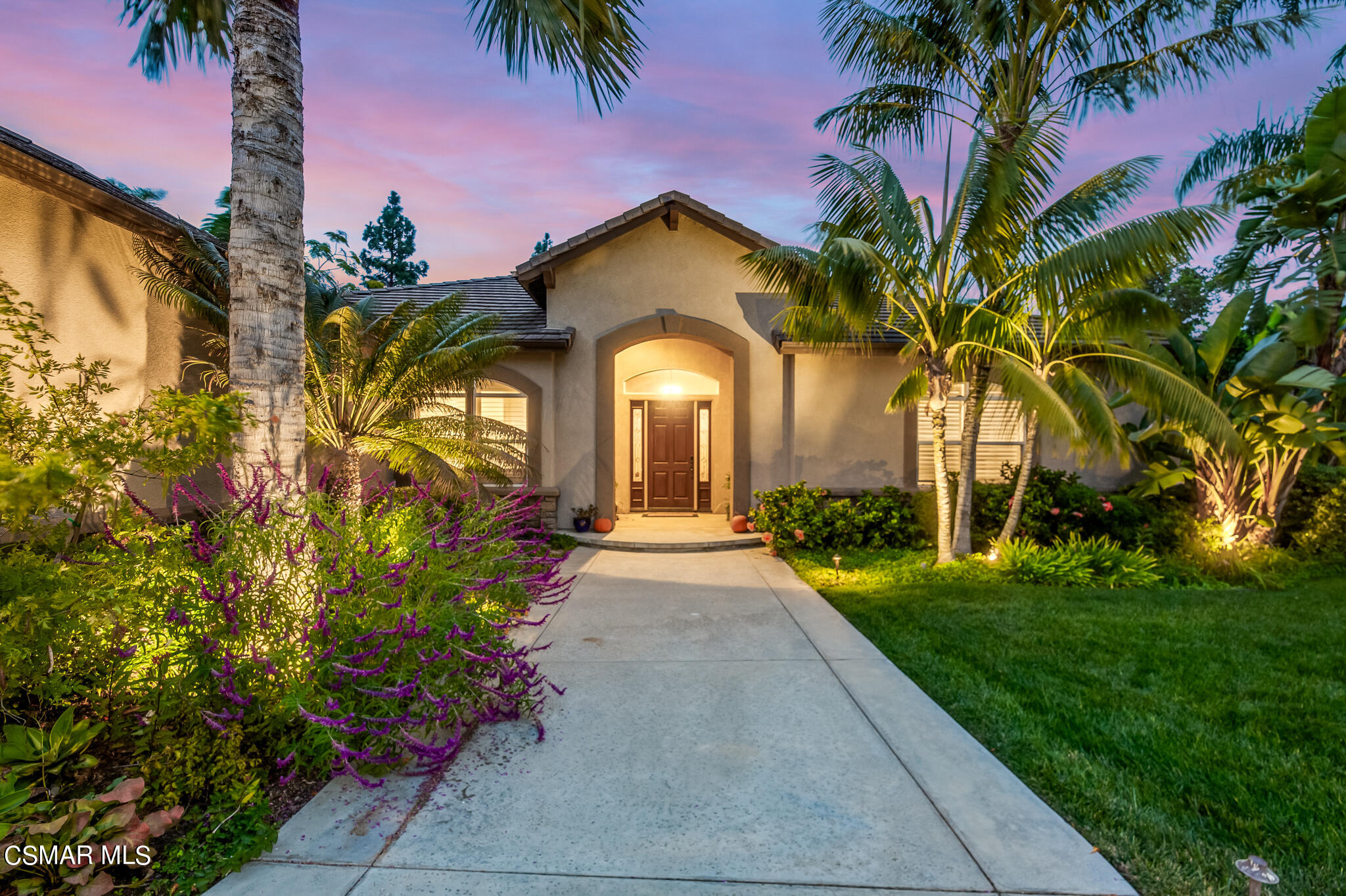 1776 Corte Jubilo Camarillo, CA 93012 - Photo 64 of 74 a view of a house with a small yard and a palm tree