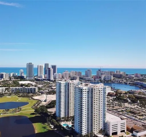a view of a city with tall buildings