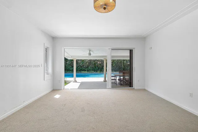 a view of livingroom with furniture and floor to ceiling window