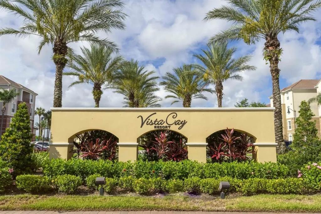 5025 Shoreway Loop, Unit 10703 Orlando, FL 32819 - Photo 26 of 53 a couple of potted plants in front of door