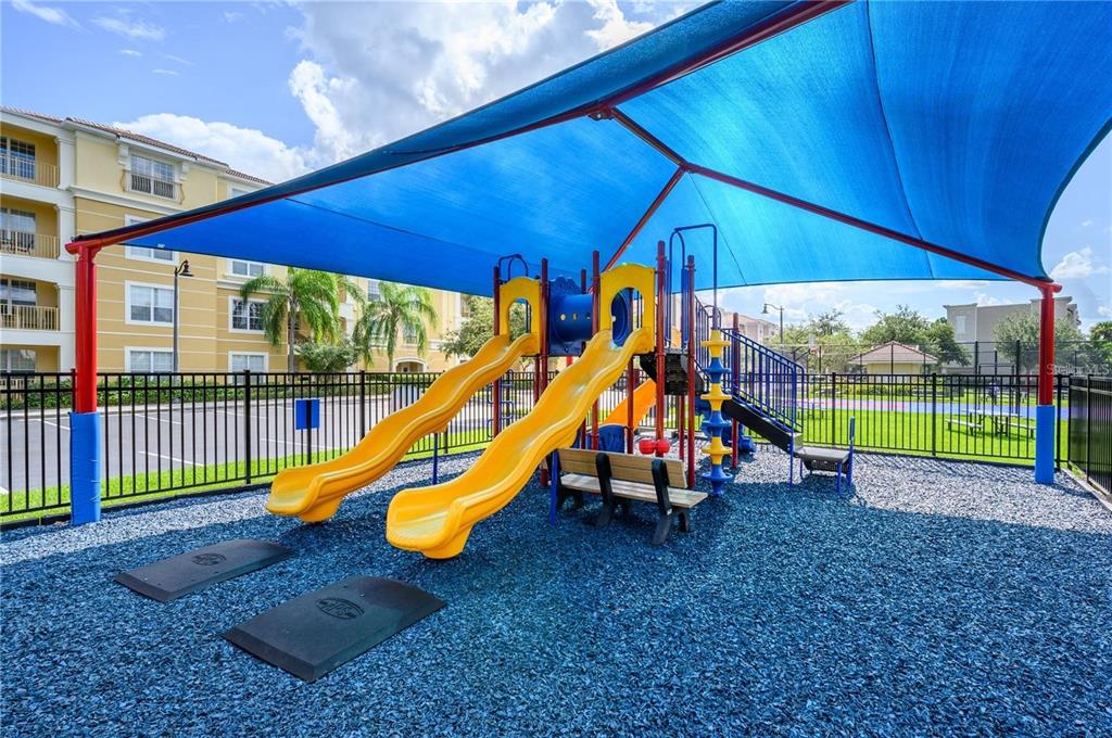 5025 Shoreway Loop, Unit 10703 Orlando, FL 32819 - Photo 39 of 53 a view of park with slide