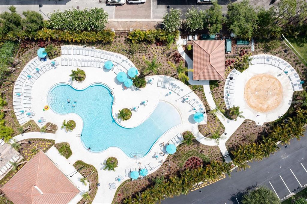 5025 Shoreway Loop, Unit 10703 Orlando, FL 32819 - Photo 43 of 53 aerial view of a house with swimming pool and garden