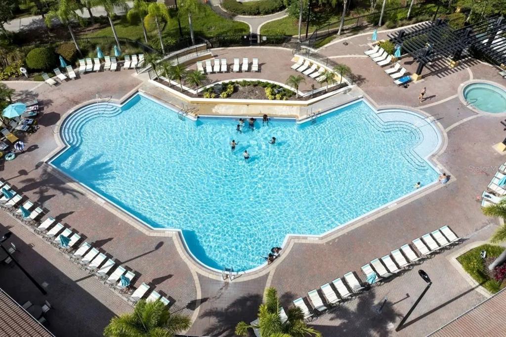 5025 Shoreway Loop, Unit 10703 Orlando, FL 32819 - Photo 44 of 53 a view of a swimming pool with a patio