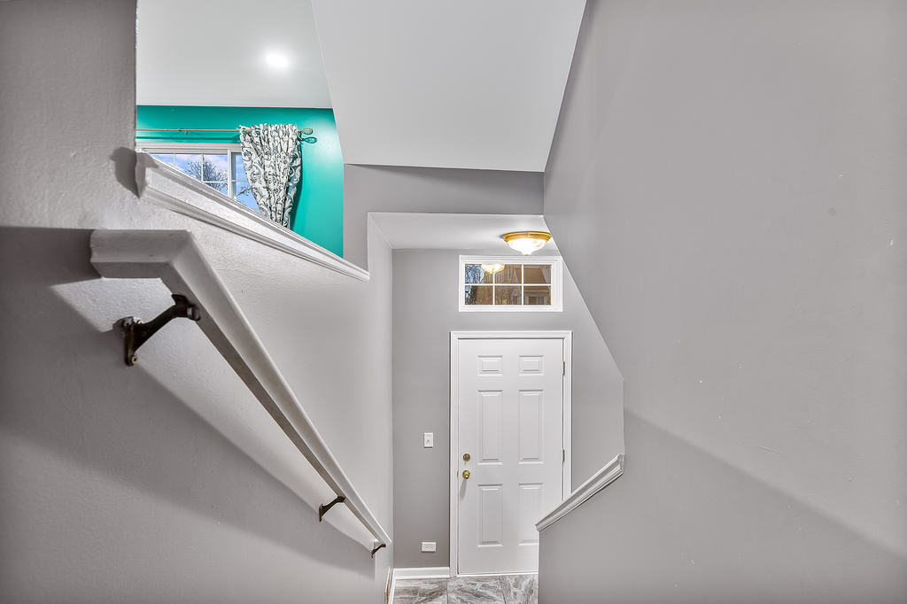 2452 Daybreak Court, Unit 2452 Elgin, IL 60123 - Photo 17 of 22 a view of entryway with a window