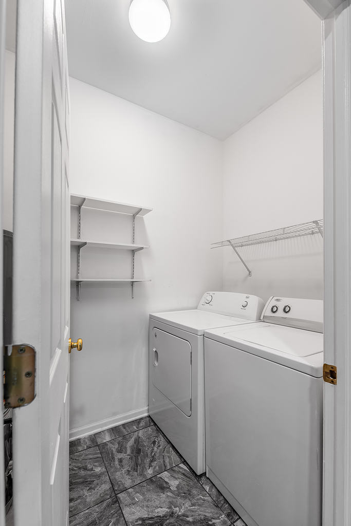 2452 Daybreak Court, Unit 2452 Elgin, IL 60123 - Photo 5 of 22 a utility room with dryer and washer