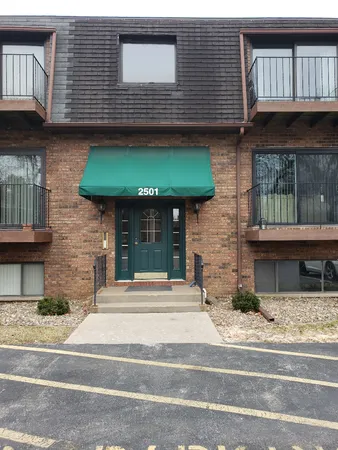 a view of a house with a patio