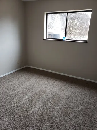 an empty room with a window