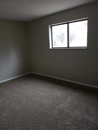 an empty room with a window