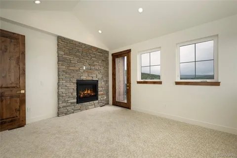 a picture of a bench in front of a wall