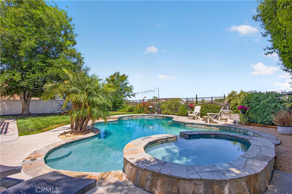 31928 Cercle Chambertin Temecula, CA 92591 - Photo 52 of 74 a view of a swimming pool with a patio