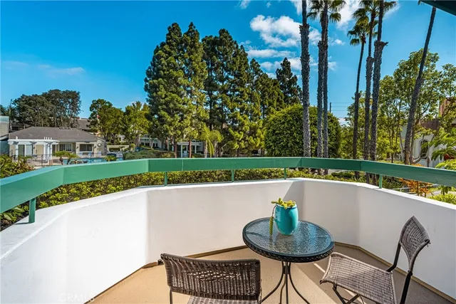 a swimming pool with outdoor seating and yard