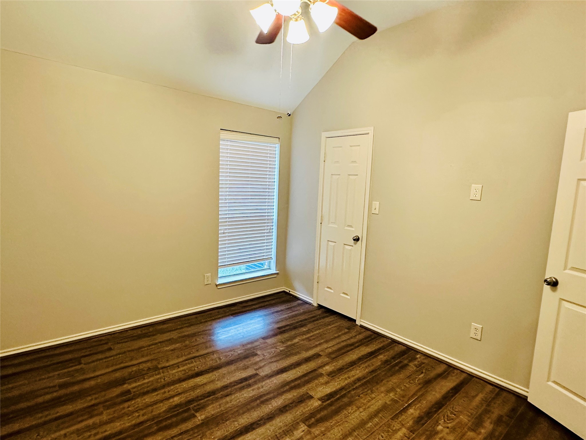 5643 Walnut Glen Lane Rosenberg, TX 77471 - Photo 18 of 35 a view of an empty room with wooden floor