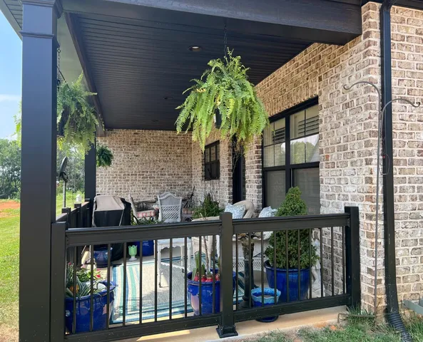 a balcony view with a sink