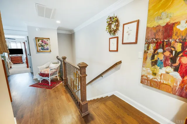 an aerial view of a house with a swimming pool