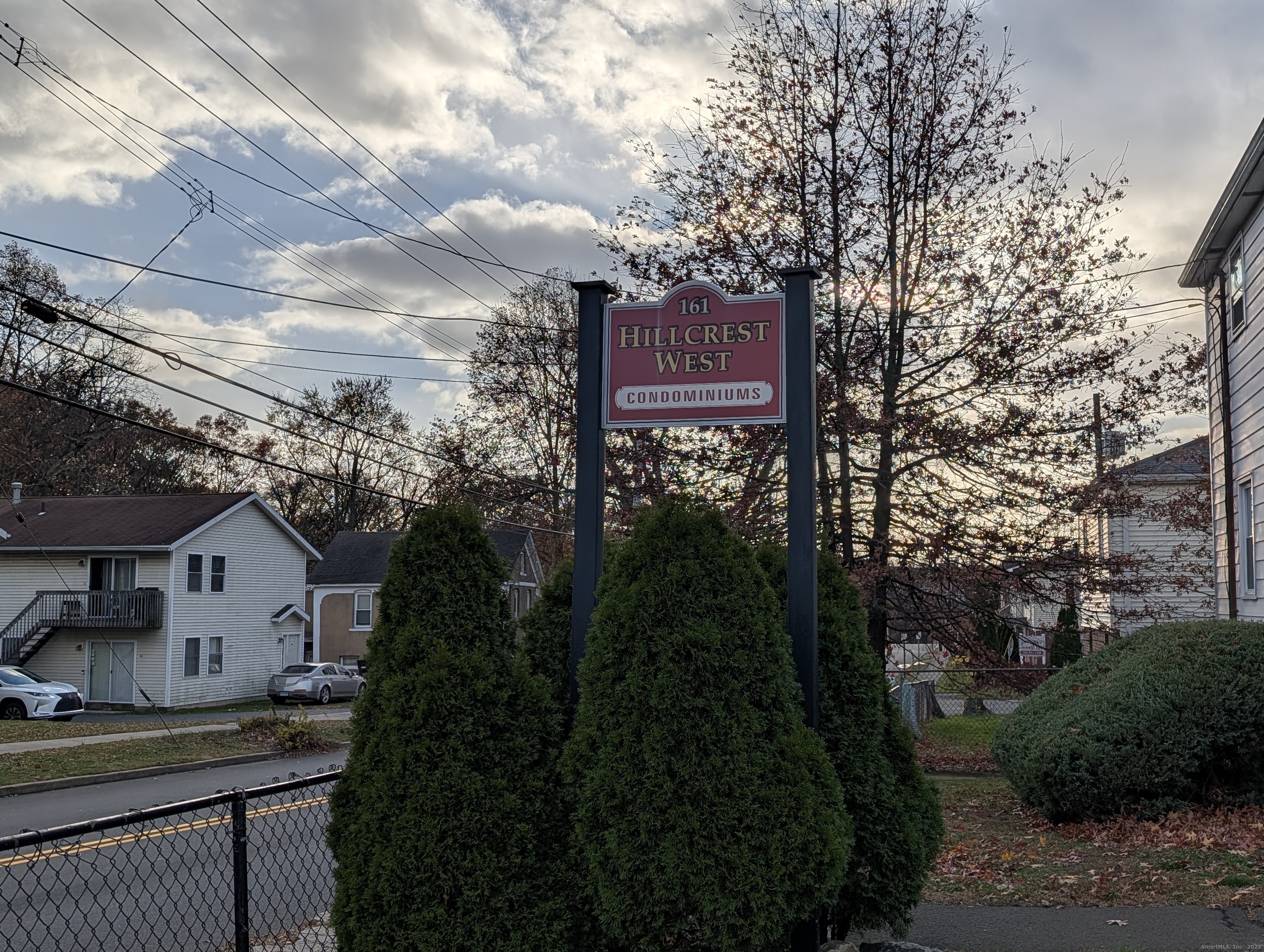 161 West Spring Street, Unit B2 West Haven, CT 06516 - Photo 1 of 17 a sign board with buildings in background