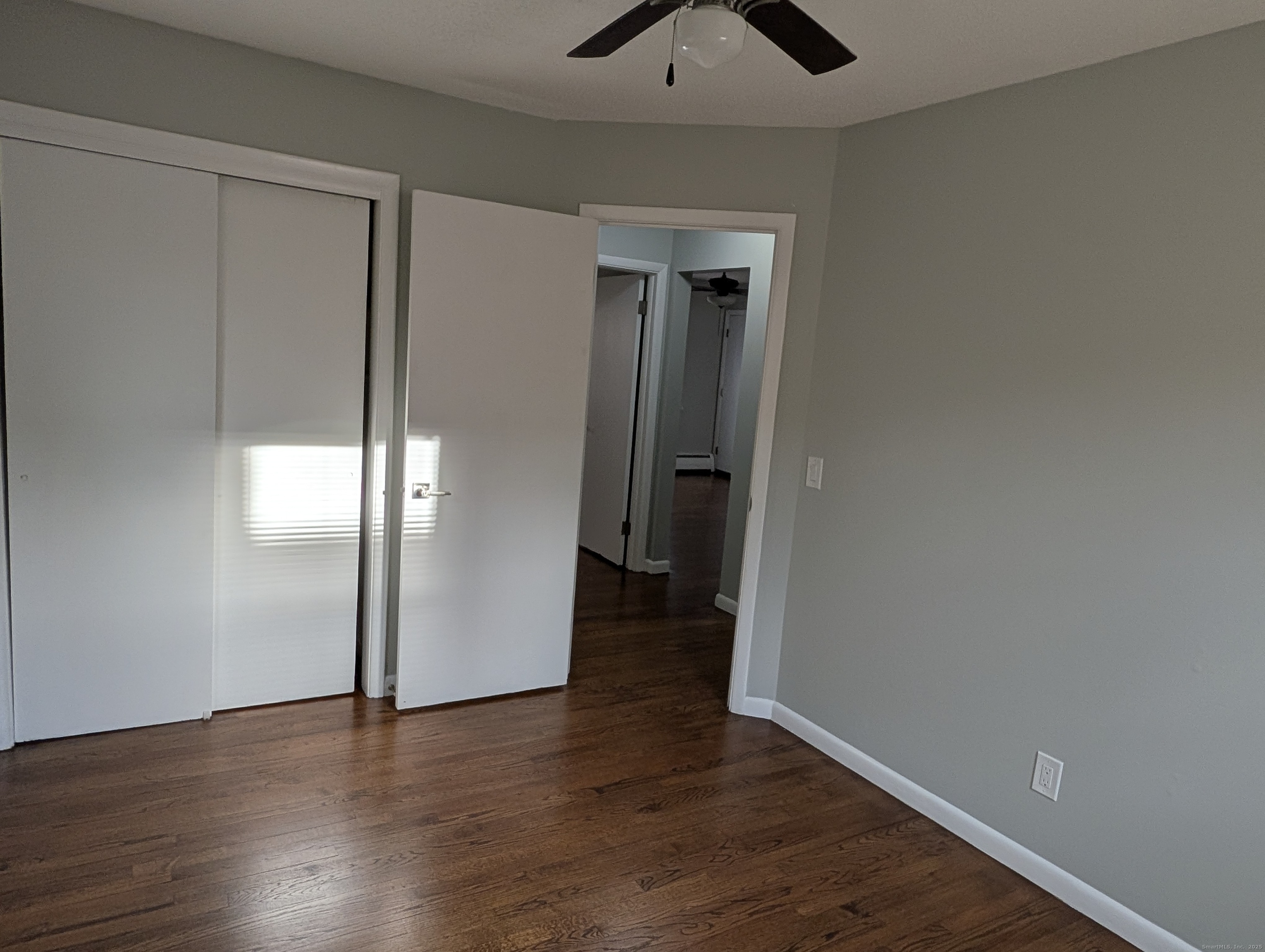 161 West Spring Street, Unit B2 West Haven, CT 06516 - Photo 11 of 17 an empty room with wooden floor and entrance