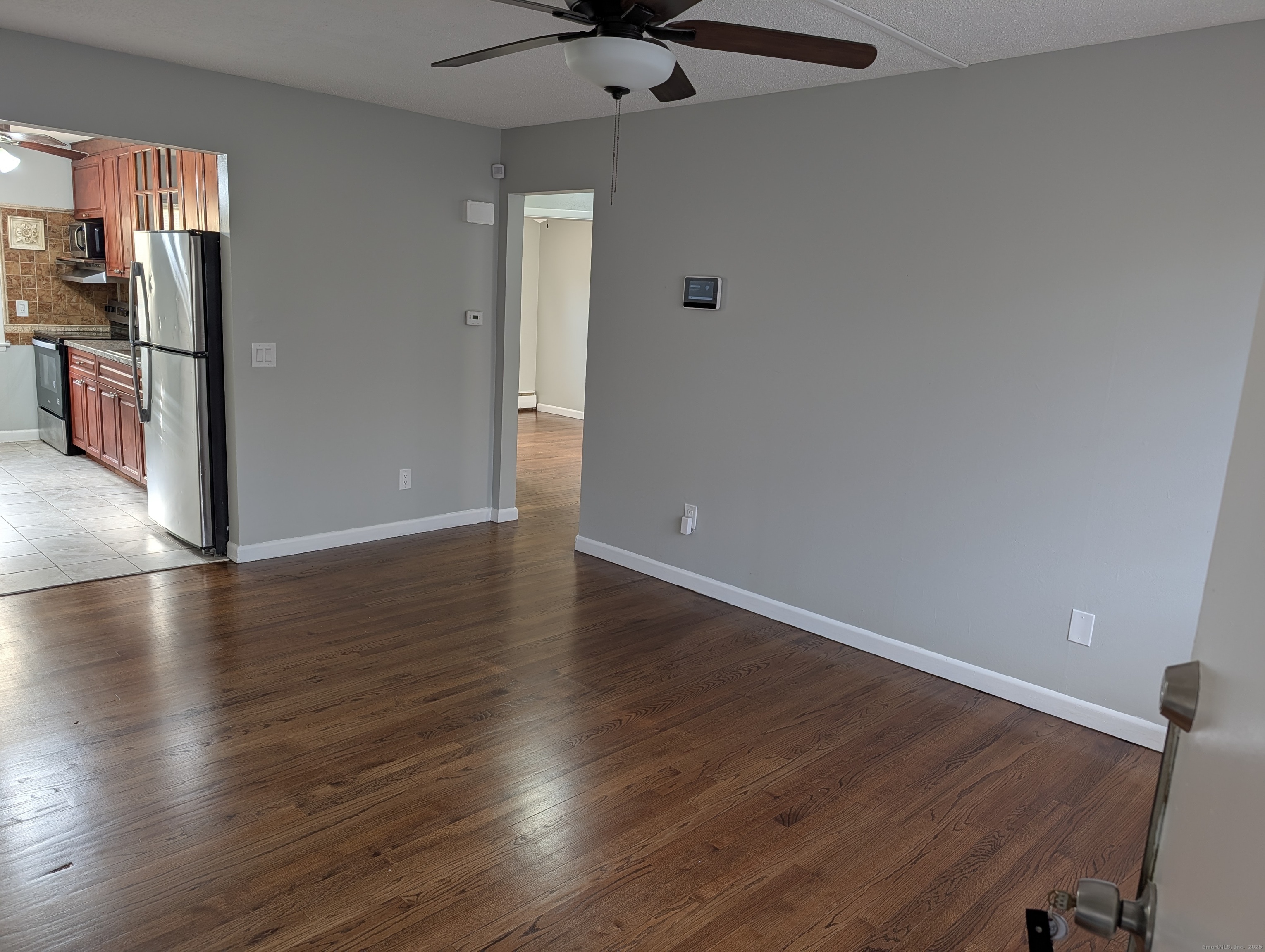 161 West Spring Street, Unit B2 West Haven, CT 06516 - Photo 12 of 17 a view of a livingroom with wooden floor