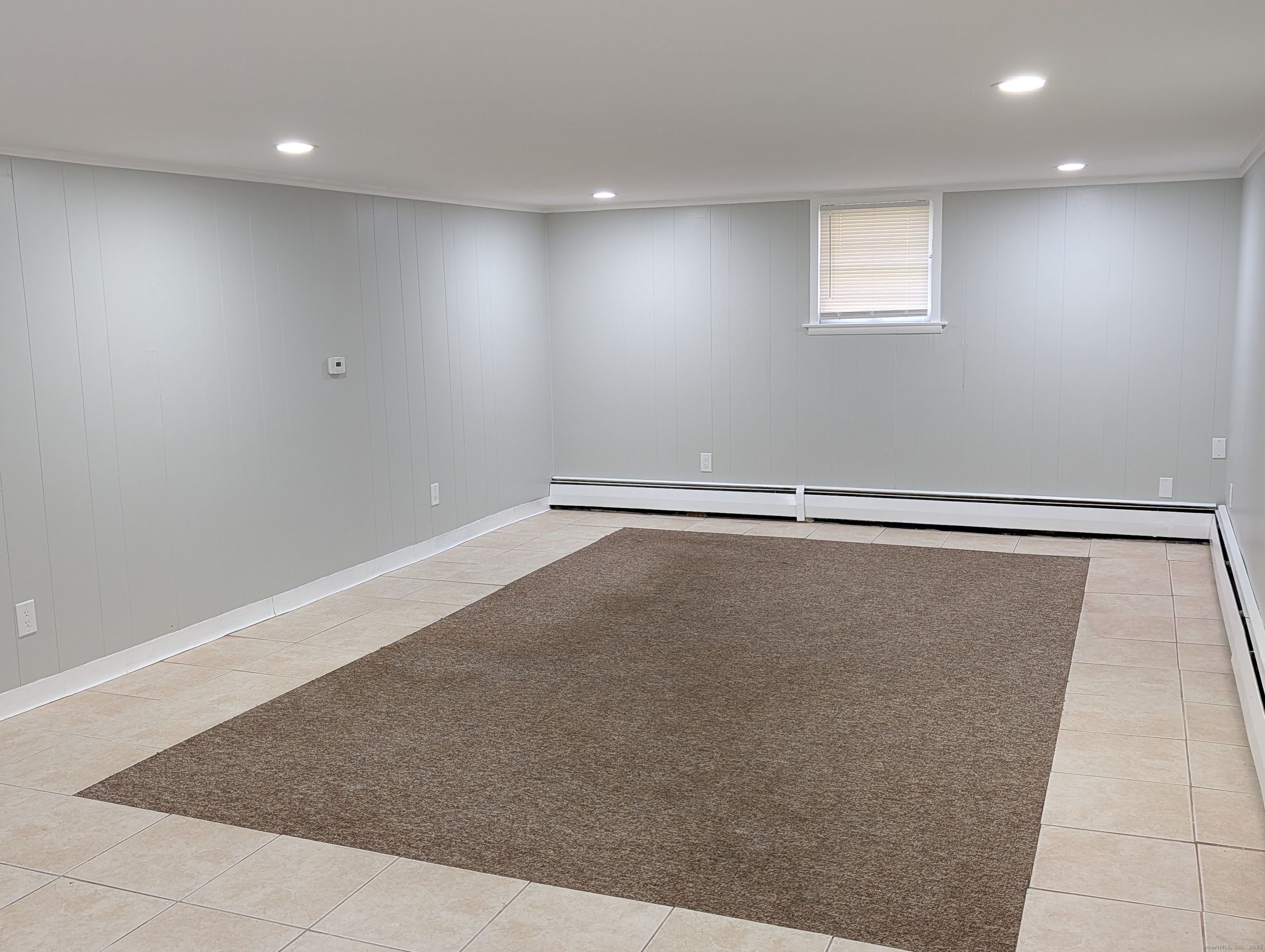 161 West Spring Street, Unit B2 West Haven, CT 06516 - Photo 13 of 17 an empty room with a workbench