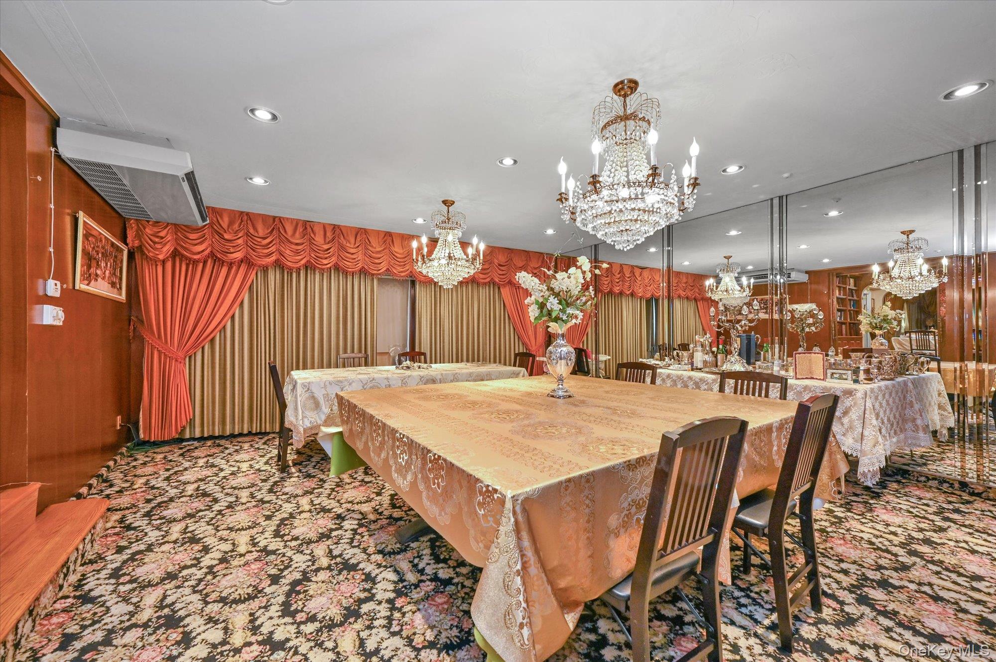 147-01 70th Avenue Queens, NY 11367 - Photo 9 of 21 a large kitchen with a table and chairs
