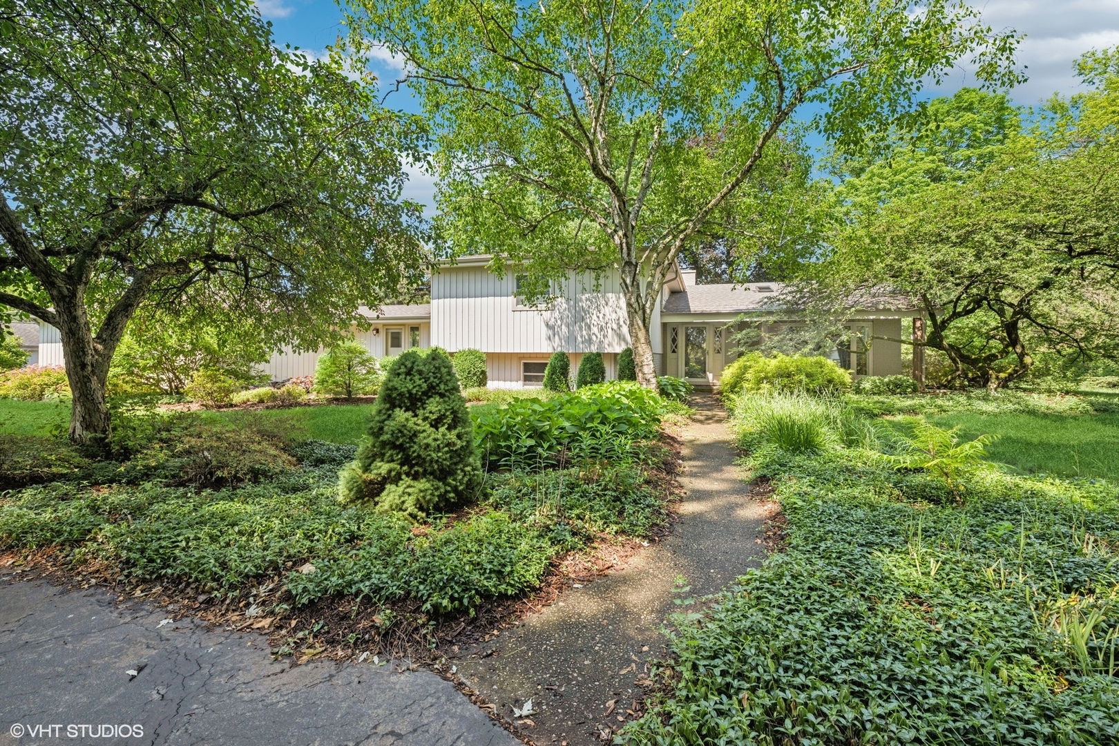 a view of a garden with trees
