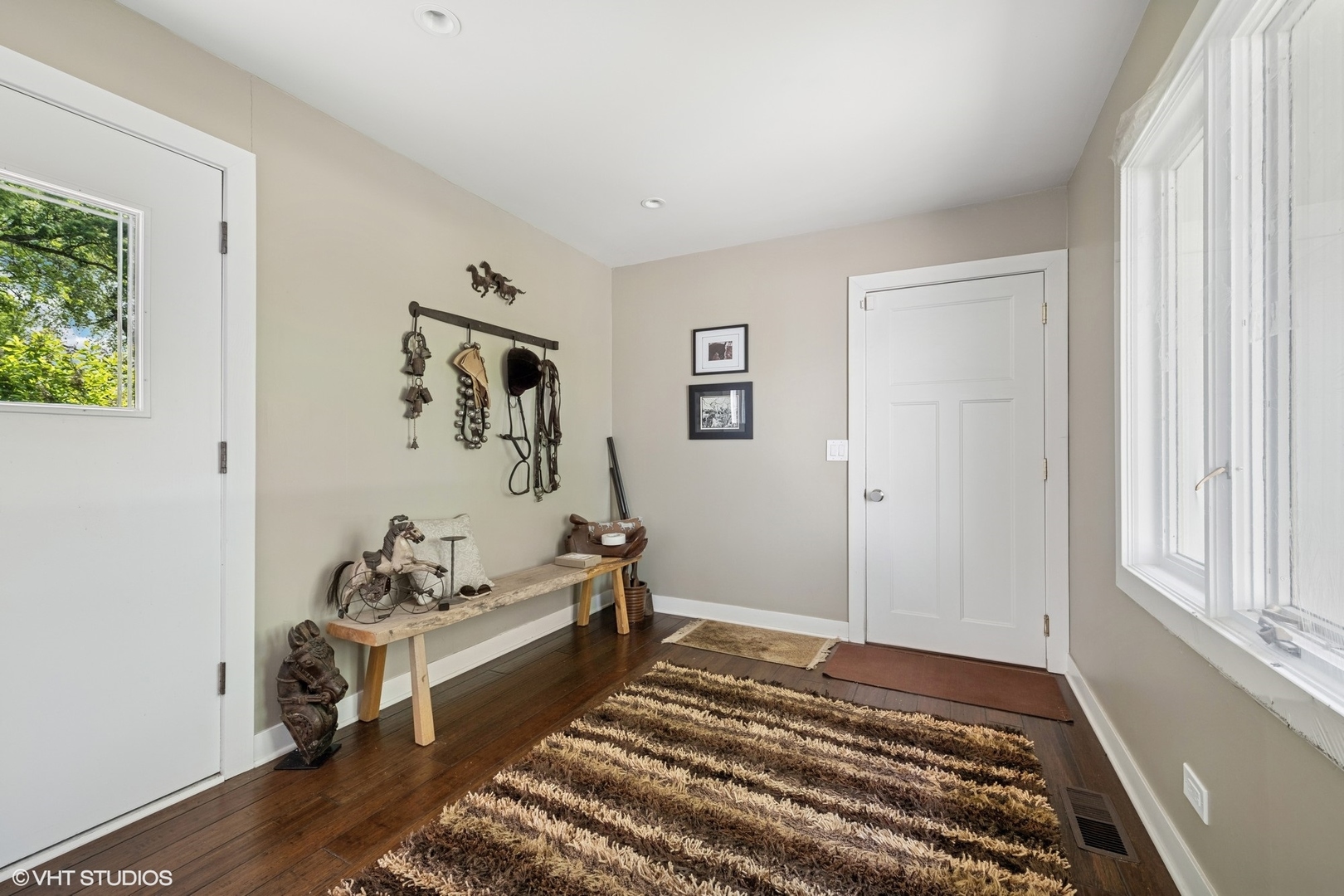 180 A Old Sutton Road Barrington Hills, IL 60010 - Photo 22 of 30 a spacious bedroom with a bed and a window