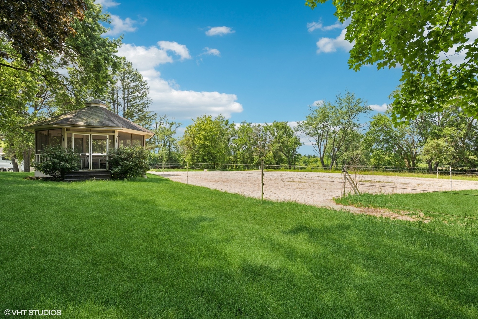 180 A Old Sutton Road Barrington Hills, IL 60010 - Photo 28 of 30 a view of a house with a yard