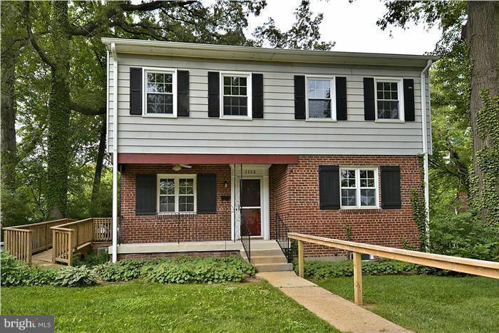 2808 Ivydale Street Silver Spring, MD 20902 - Photo 1 of 25 a front view of a house with a yard