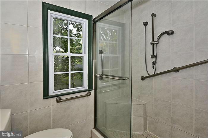 2808 Ivydale Street Silver Spring, MD 20902 - Photo 22 of 25 a bathroom with a shower and toilet