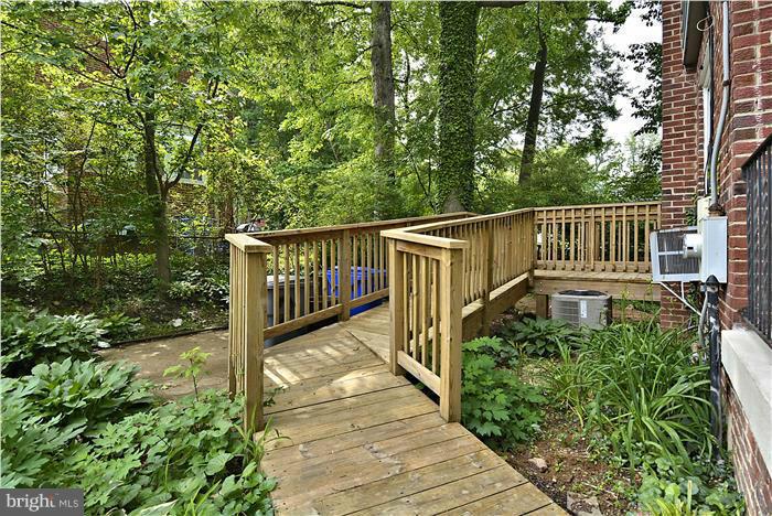 2808 Ivydale Street Silver Spring, MD 20902 - Photo 4 of 25 a view of a balcony with wooden floor