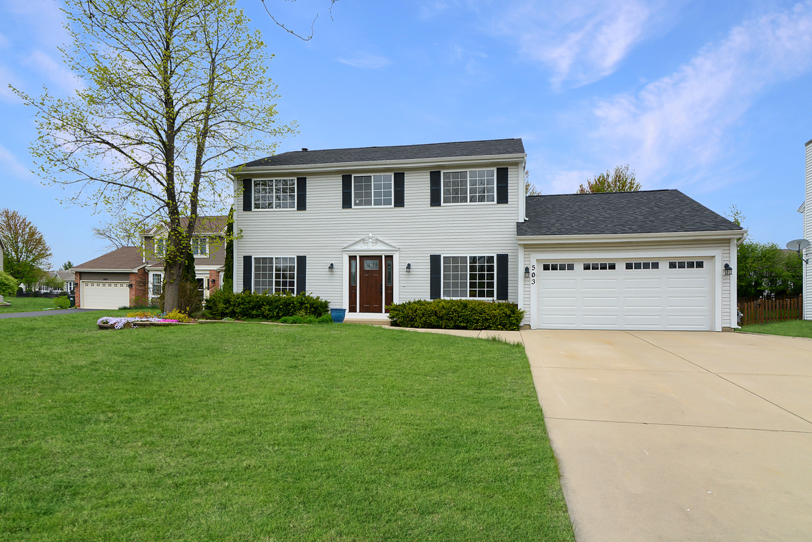 a view of house with garden