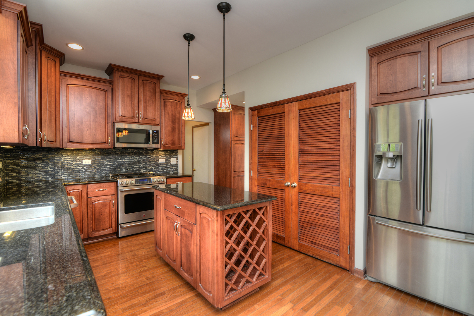 503 Yardley Drive Carol Stream, IL 60188 - Photo 14 of 41 a kitchen with stainless steel appliances granite countertop a refrigerator a stove a sink and a refrigerator