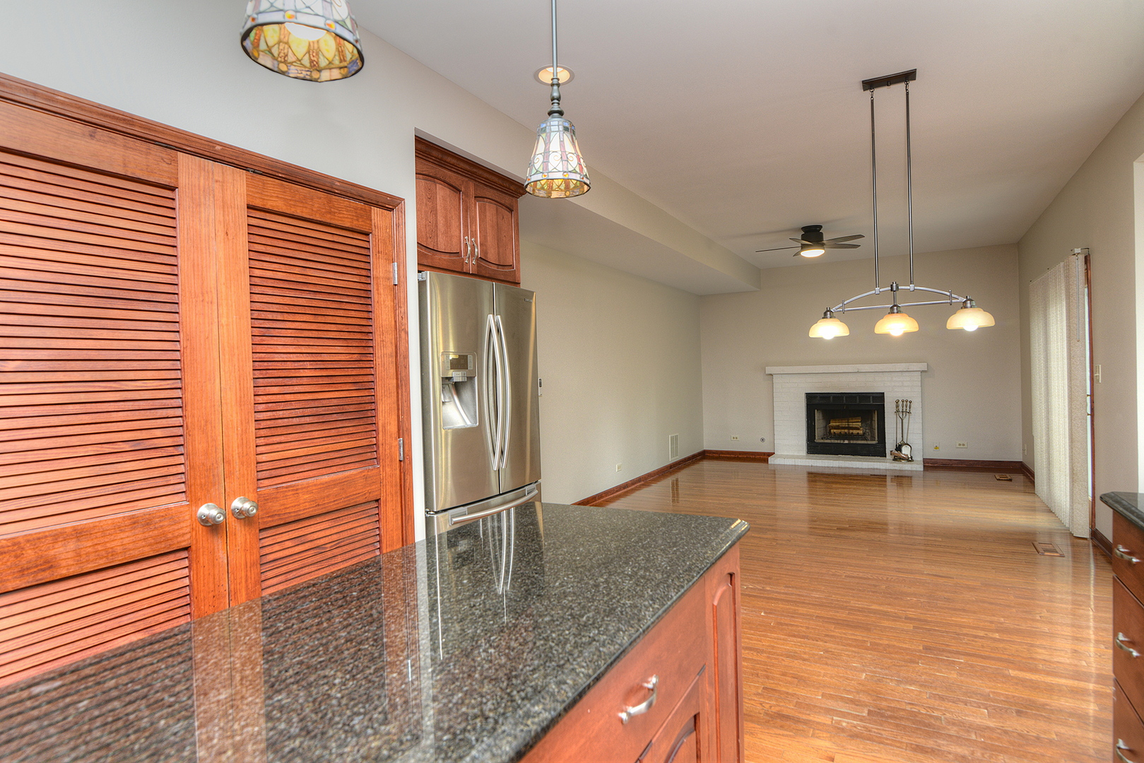 503 Yardley Drive Carol Stream, IL 60188 - Photo 17 of 41 a view of a kitchen with a sink and a chandelier