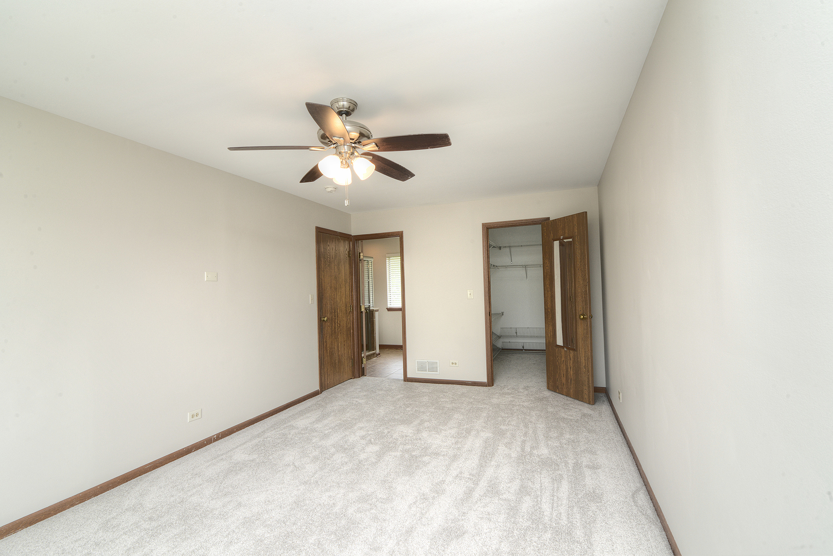 503 Yardley Drive Carol Stream, IL 60188 - Photo 22 of 41 a view of a big room with closet and chandelier fan