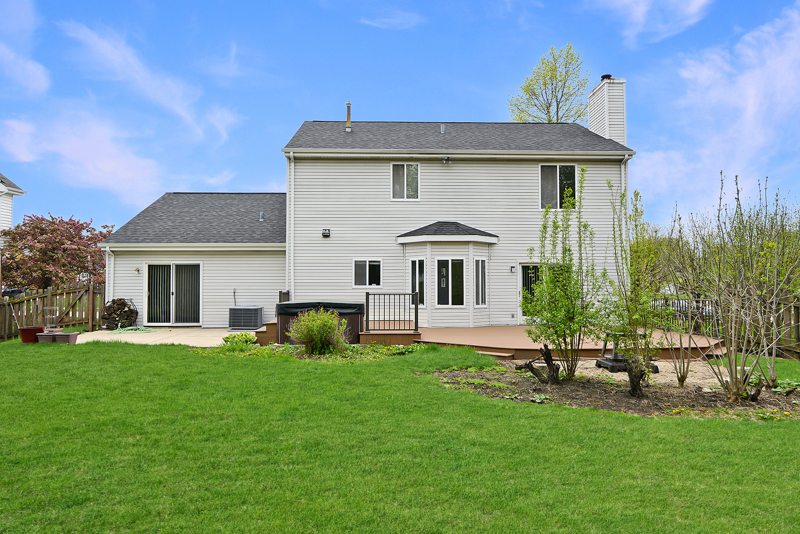 503 Yardley Drive Carol Stream, IL 60188 - Photo 36 of 41 a front view of a house with a yard and trees