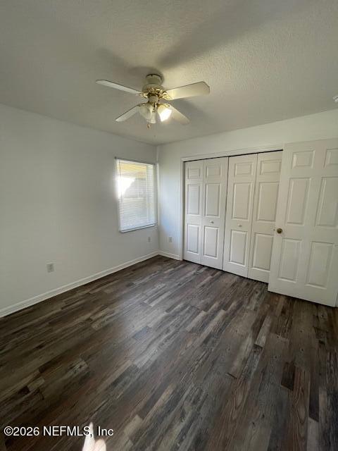 9 Lyons Place Palm Coast, FL 32137 - Photo 13 of 31 an empty room with wooden floor fan and windows
