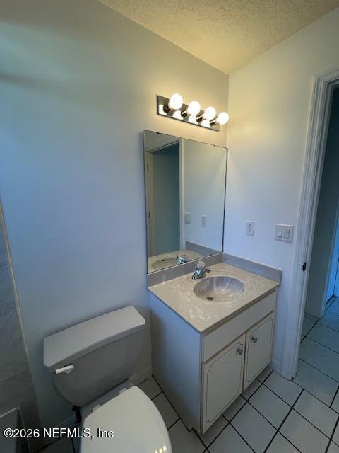 9 Lyons Place Palm Coast, FL 32137 - Photo 15 of 31 a bathroom with a granite countertop sink and a mirror