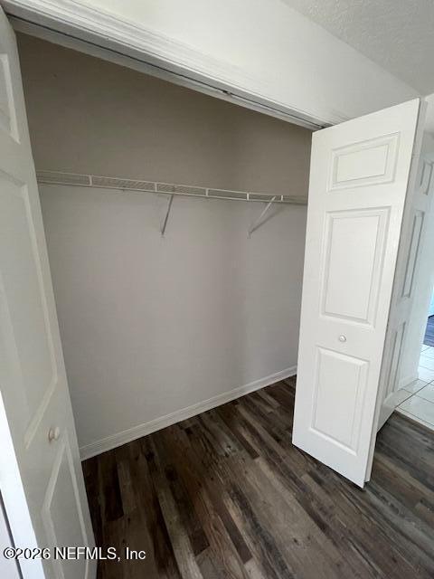 9 Lyons Place Palm Coast, FL 32137 - Photo 19 of 31 a view of walk in closet with empty racks