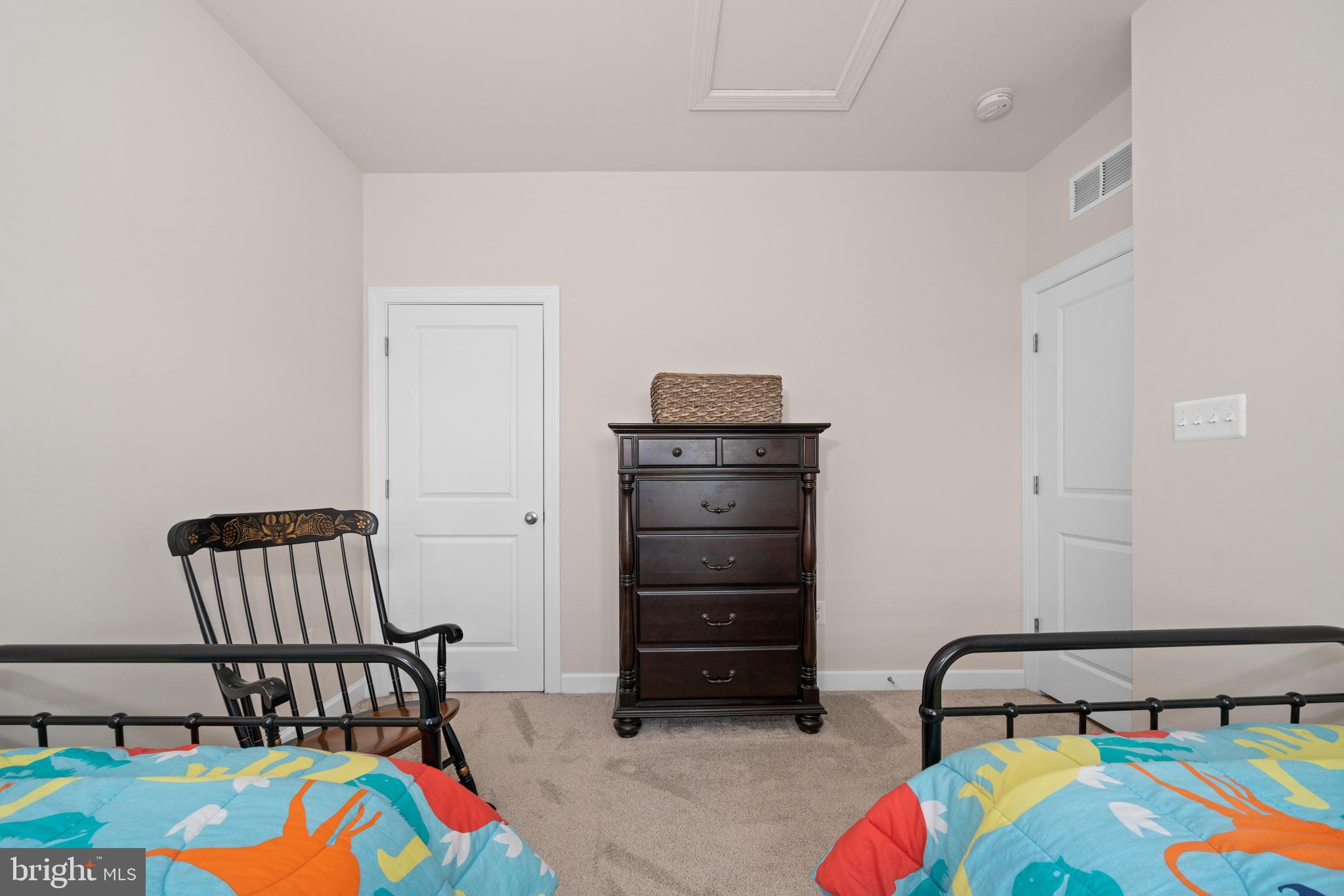 355 Dillon Circle Middletown, DE 19709 - Photo 37 of 84 a bedroom with a bed and a chair