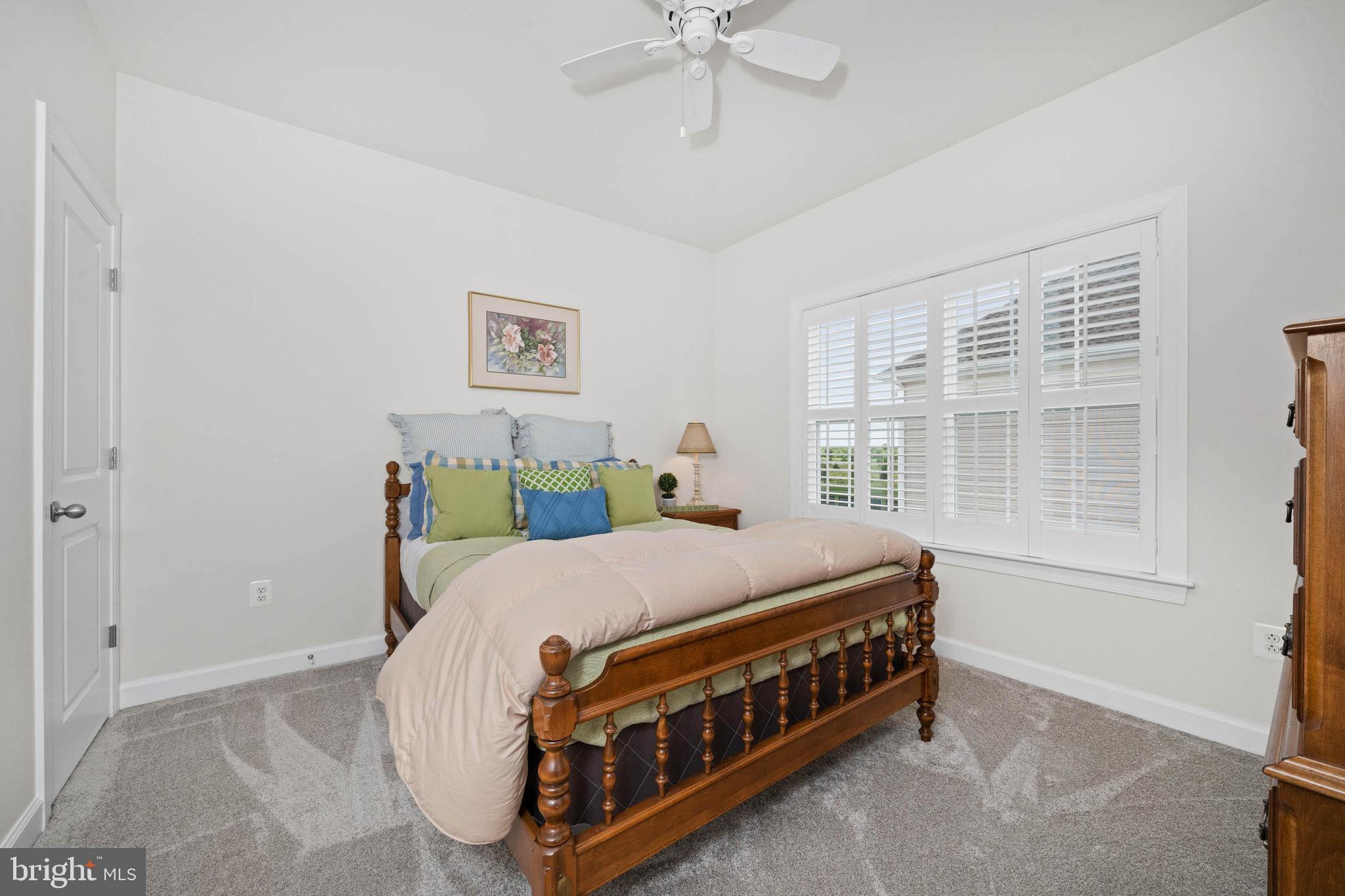 355 Dillon Circle Middletown, DE 19709 - Photo 38 of 84 a bed sitting in a bedroom next to a window